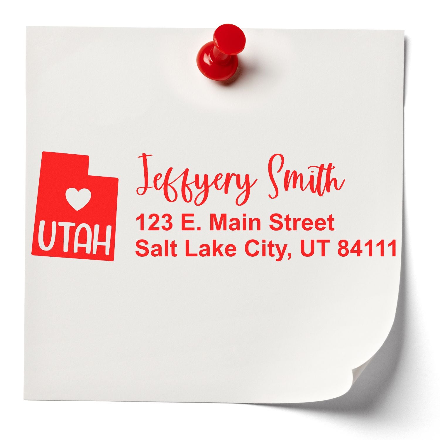 Red Utah State Love Personalized Address Stamp on white paper with a red pushpin, featuring a heart and the word UTAH, along with the name and address in red script.