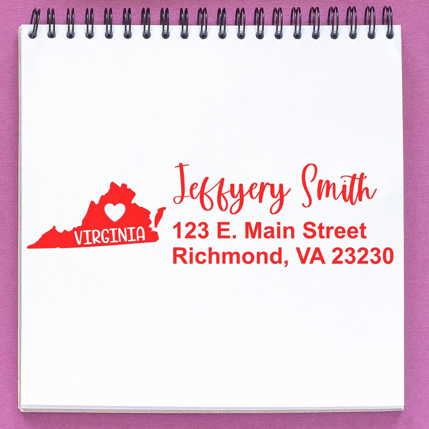 Virginia State Love Personalized Address Stamp on notepad, featuring a red Virginia map with heart, and sample address: Jeffery Smith, 123 E. Main Street, Richmond, VA 23230.