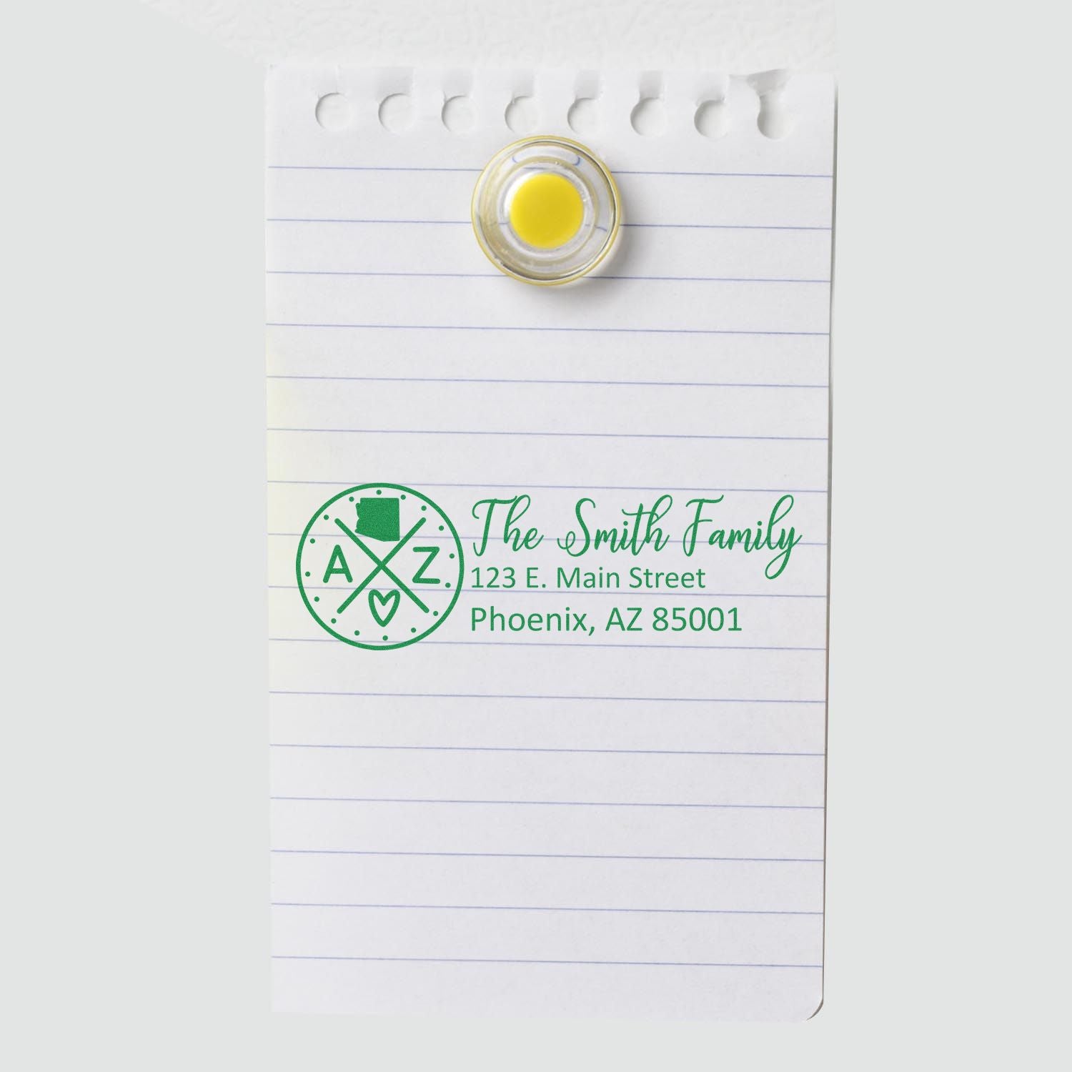 Arizona State Pride Customized Address Stamp on lined paper, displaying The Smith Family, 123 E. Main Street, Phoenix, AZ 85001 in green ink, secured with a round magnet.