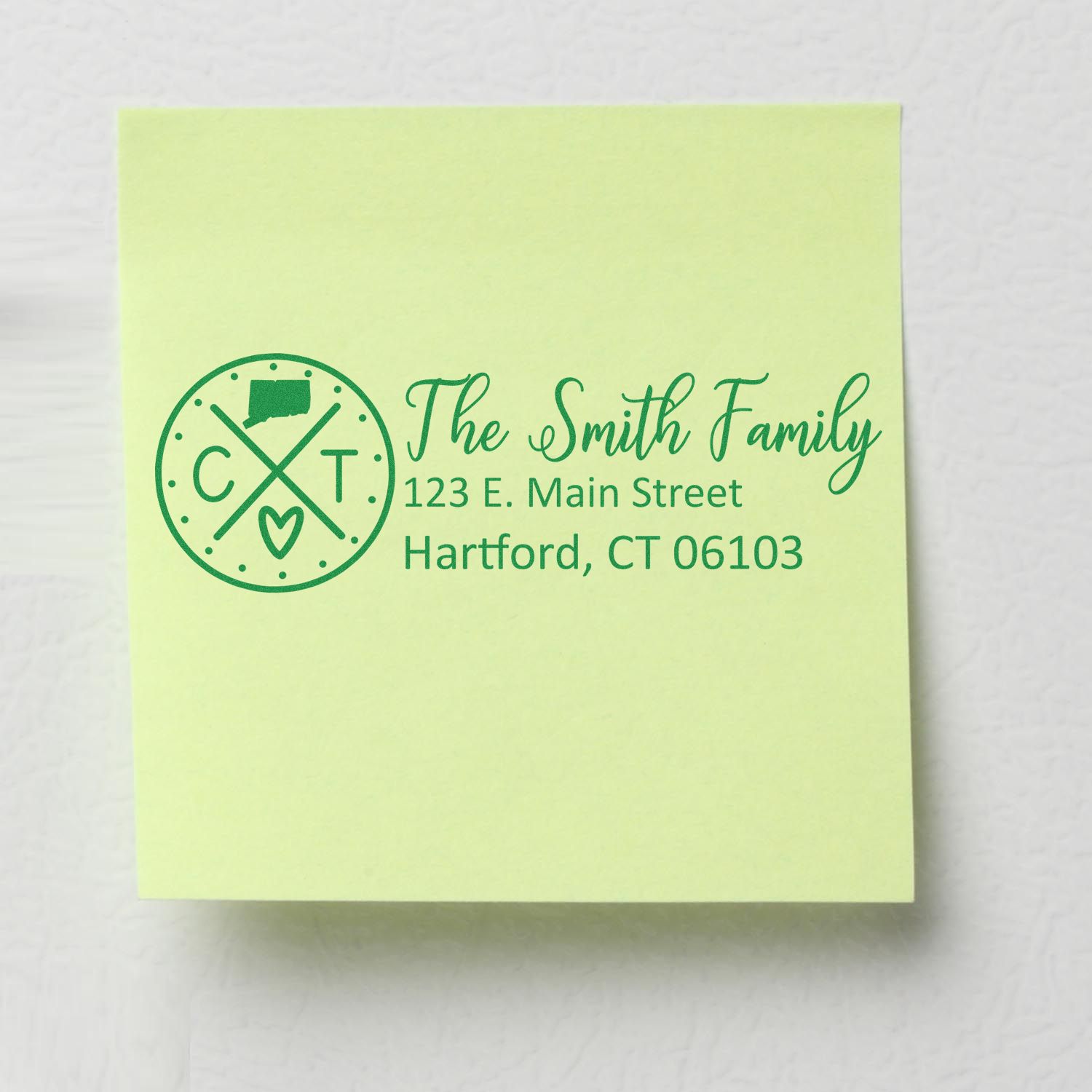 Green sticky note displaying the Connecticut State Pride Customized Address Stamp with a circular design, state outline, and personalized address for The Smith Family in Hartford, CT.