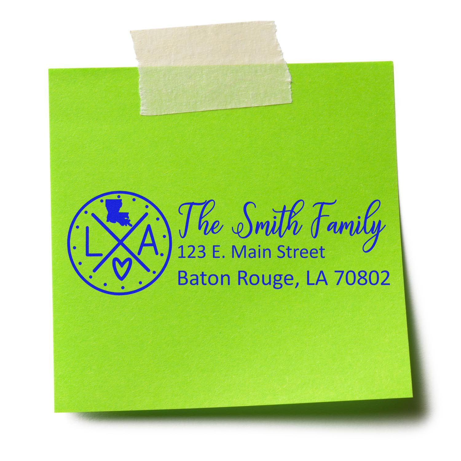 Green sticky note with a blue Louisiana State Pride Customized Address Stamp design, featuring a map outline, LA initials, and a heart. Address reads: The Smith Family, 123 E. Main Street, Baton Rouge, LA 70802.