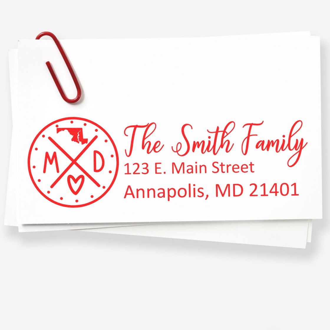 Maryland State Pride Customized Address Stamp in red ink on white paper, featuring a circular design with MD and a heart, alongside the address 123 E. Main Street, Annapolis, MD 21401.