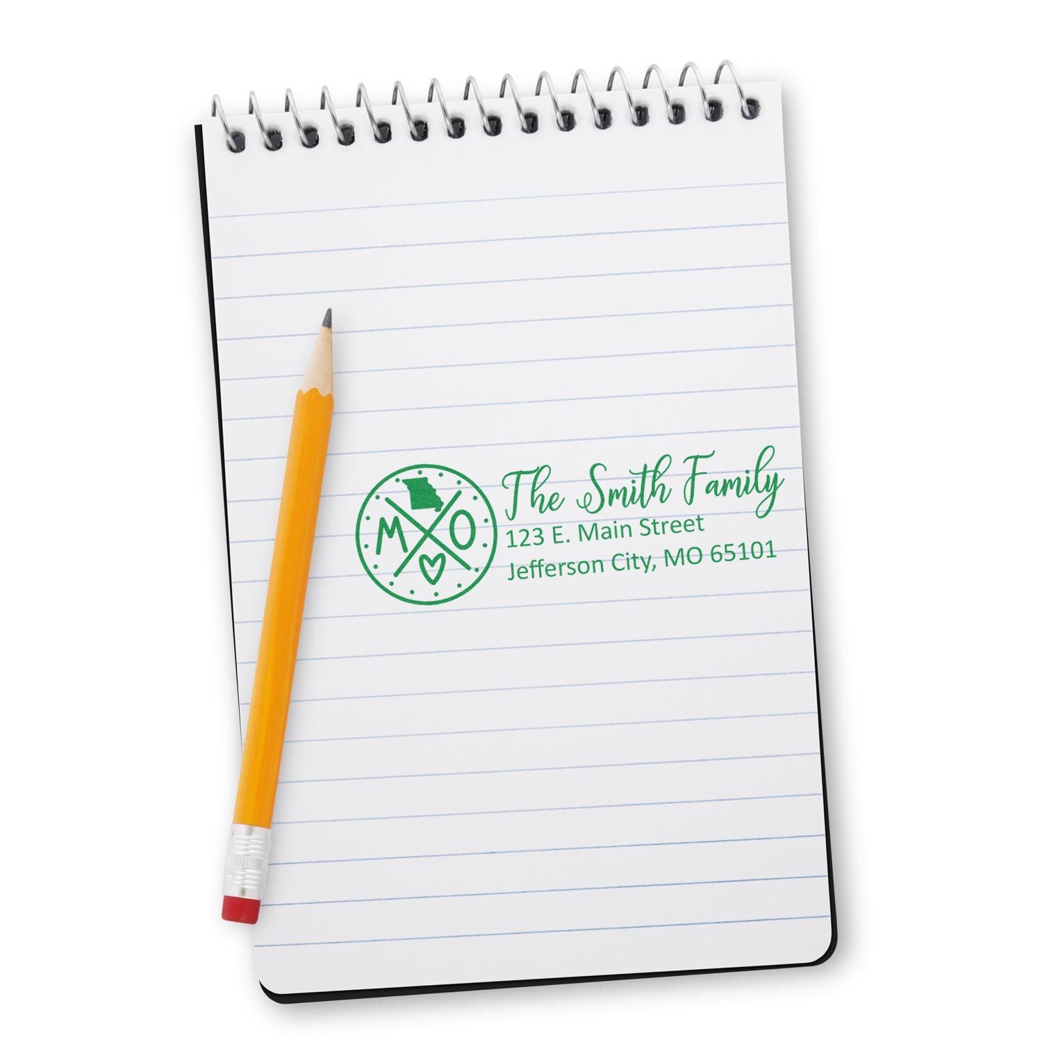 Missouri State Pride Customized Address Stamp on a notepad with a pencil. The stamp displays The Smith Family and an address in green ink, featuring a Missouri state outline and heart.