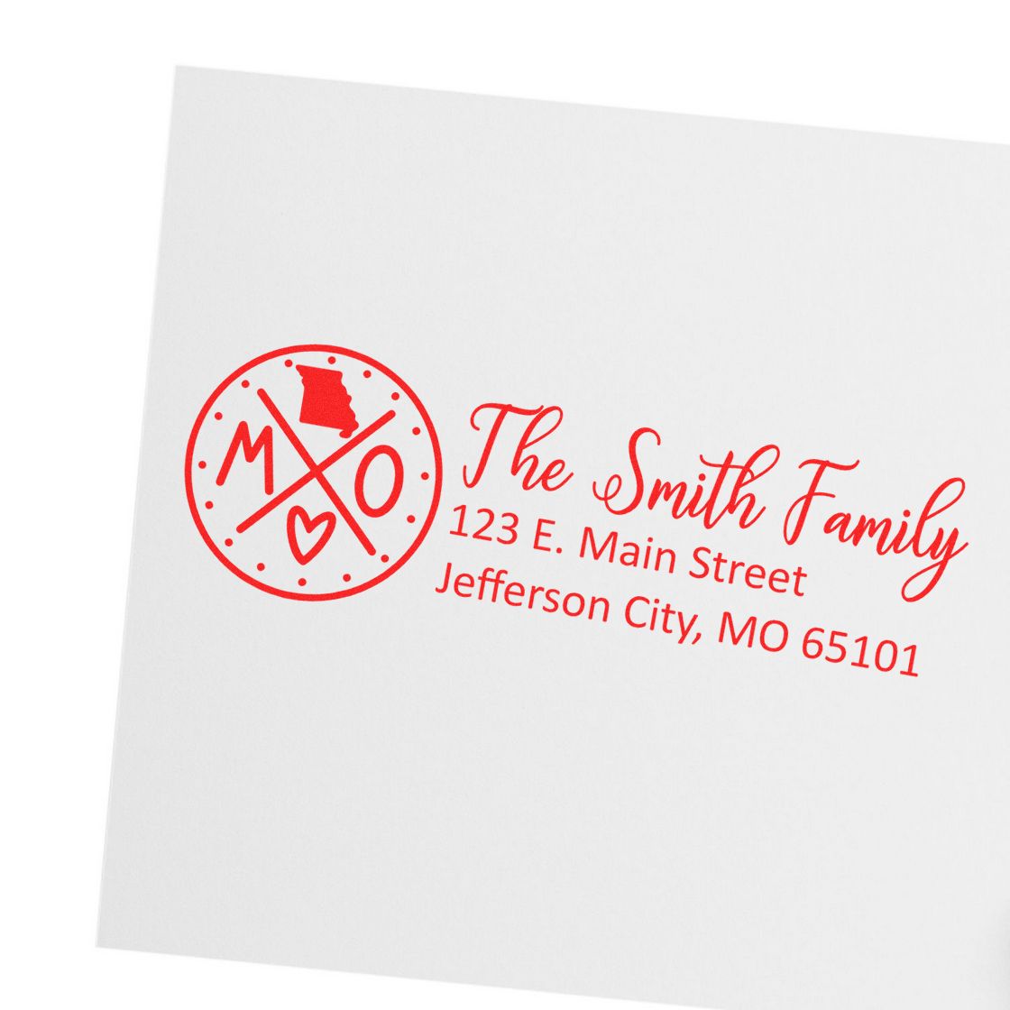 Slim Missouri Customized Pre-Inked Address Stamp in red ink on white paper, featuring a circular design with MO and heart symbols, alongside personalized address details for the Smith Family.