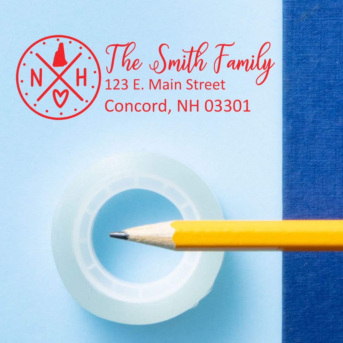 A Slim New Hampshire Customized Pre-Inked Address Stamp imprint on blue paper, featuring a red design with text for The Smith Family and a pencil beside a roll of tape.