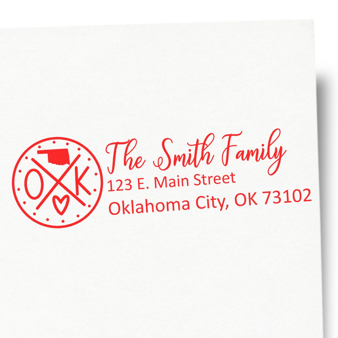 PSI Pre-Inked Oklahoma State Pride Customized Address Stamp in red ink, featuring a circular OK design with a heart, personalized with The Smith Family and an Oklahoma City address.