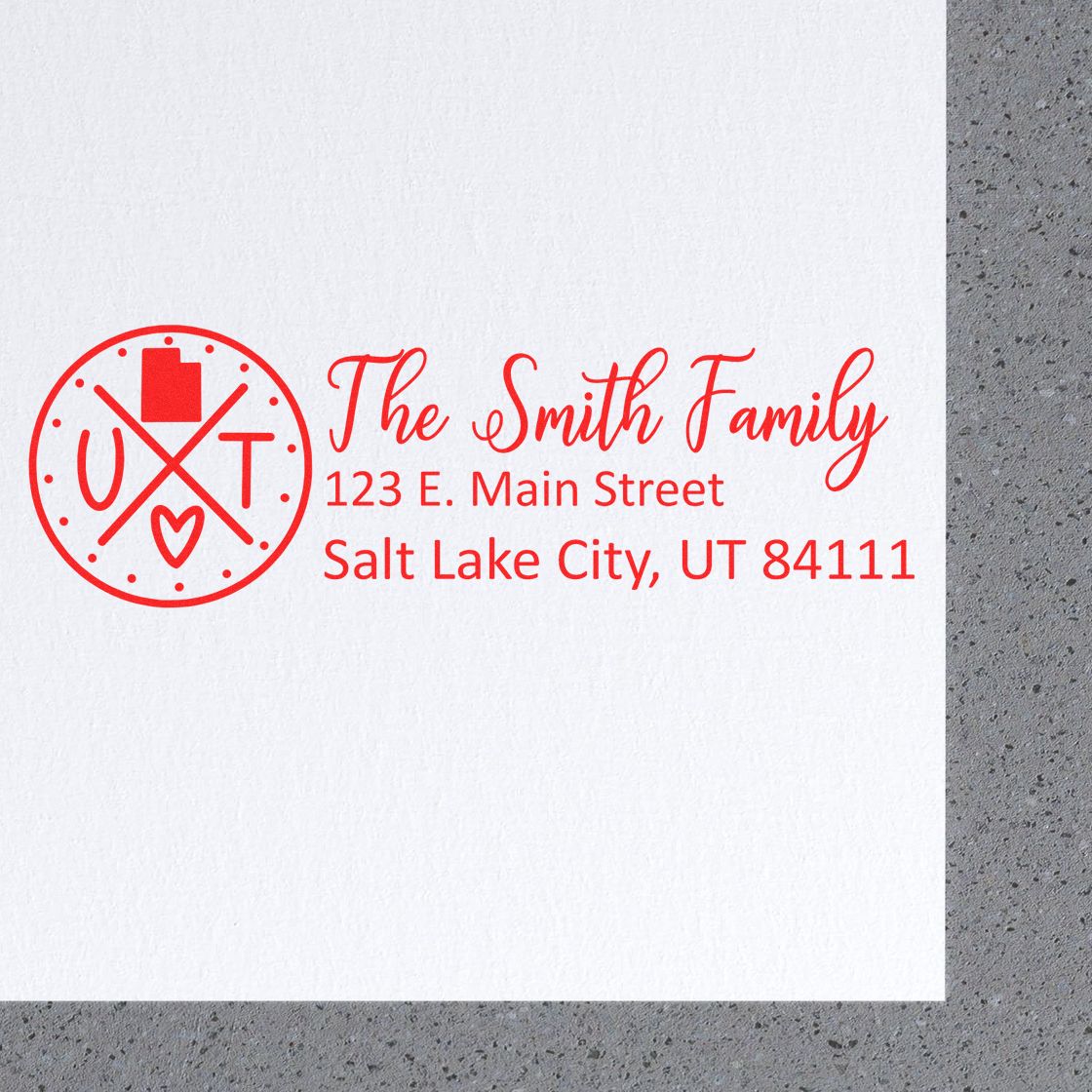 PSI Pre-Inked Utah State Pride Customized Address Stamp featuring a red design with The Smith Family and a Utah emblem on a white envelope, showcasing a personalized address in Salt Lake City.