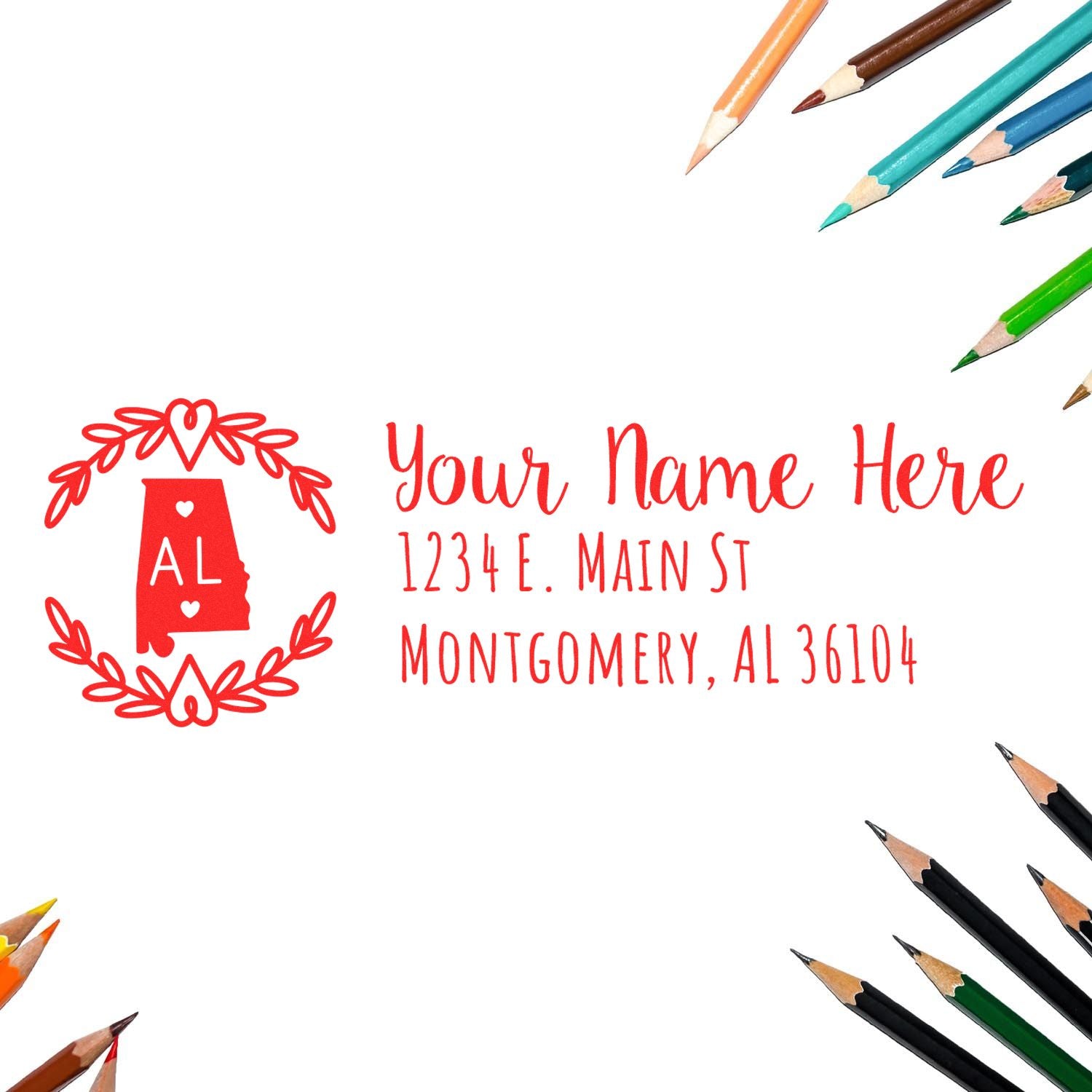 PSI Pre-Inked Alabama State Customized Address Stamp with red Alabama outline and floral design, surrounded by colored pencils. Text: Your Name Here, 1234 E. Main St, Montgomery, AL 36104.