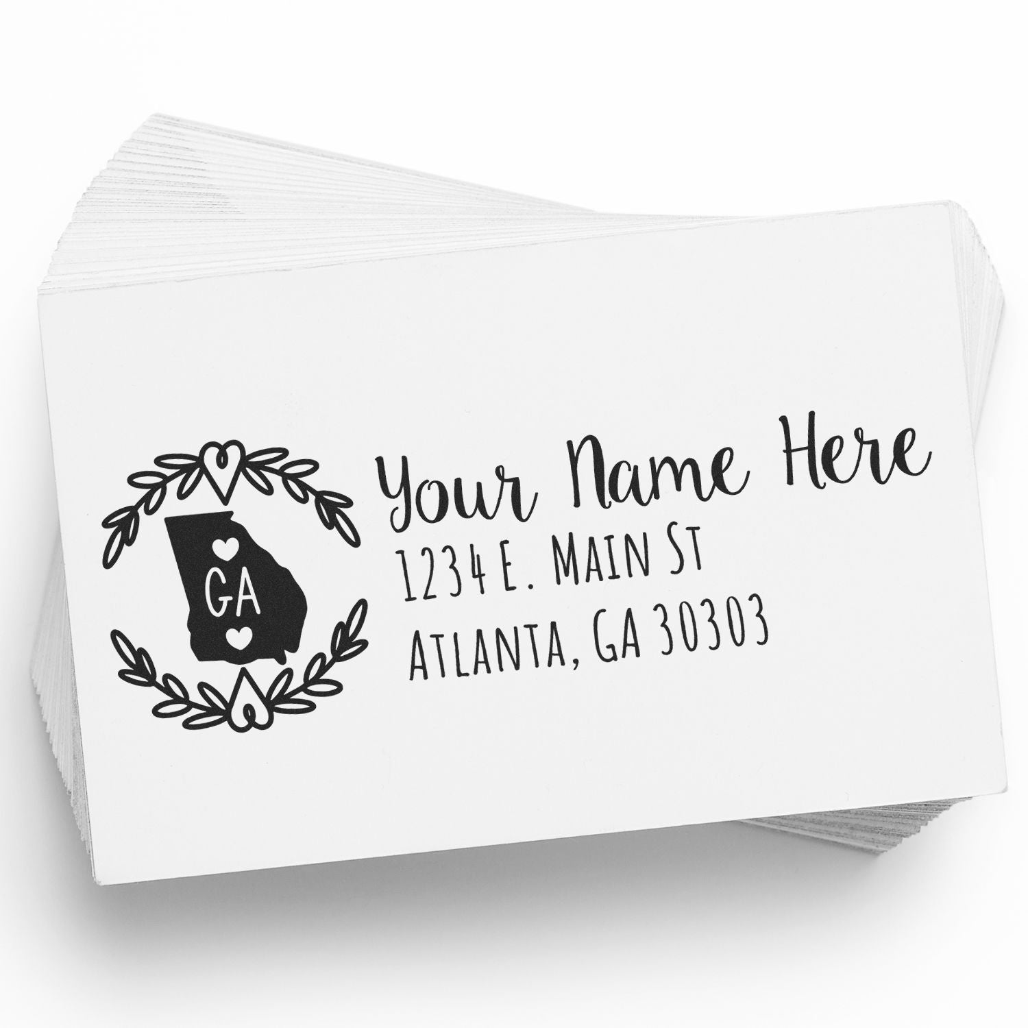 Georgia State Custom Return Address Stamp on white paper, featuring a heart design around the state outline with sample text: Your Name Here, 1234 E. Main St, Atlanta, GA 30303.