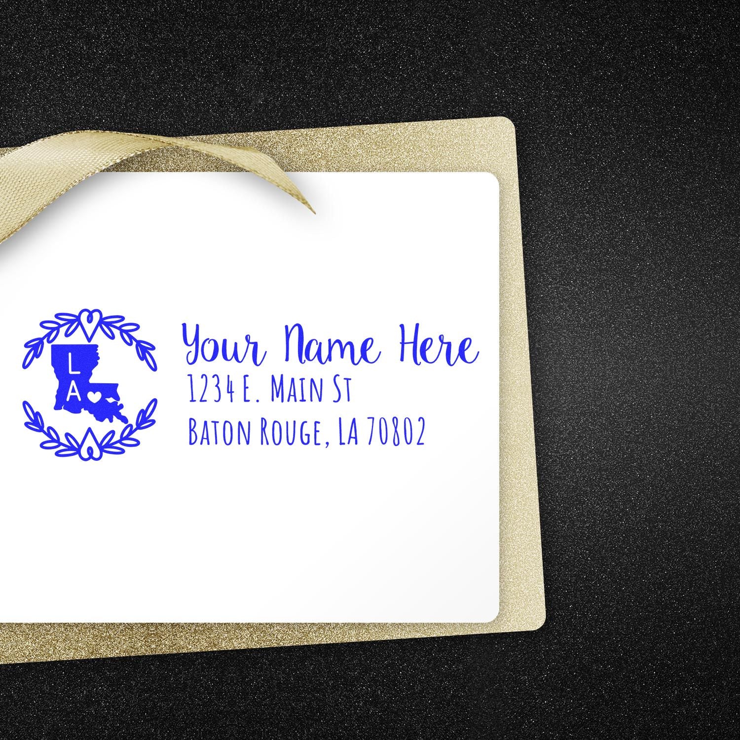 Louisiana State Custom Return Address Stamp on a white envelope with gold trim, featuring a blue design of the state and laurel wreath, personalized with name and Baton Rouge address.