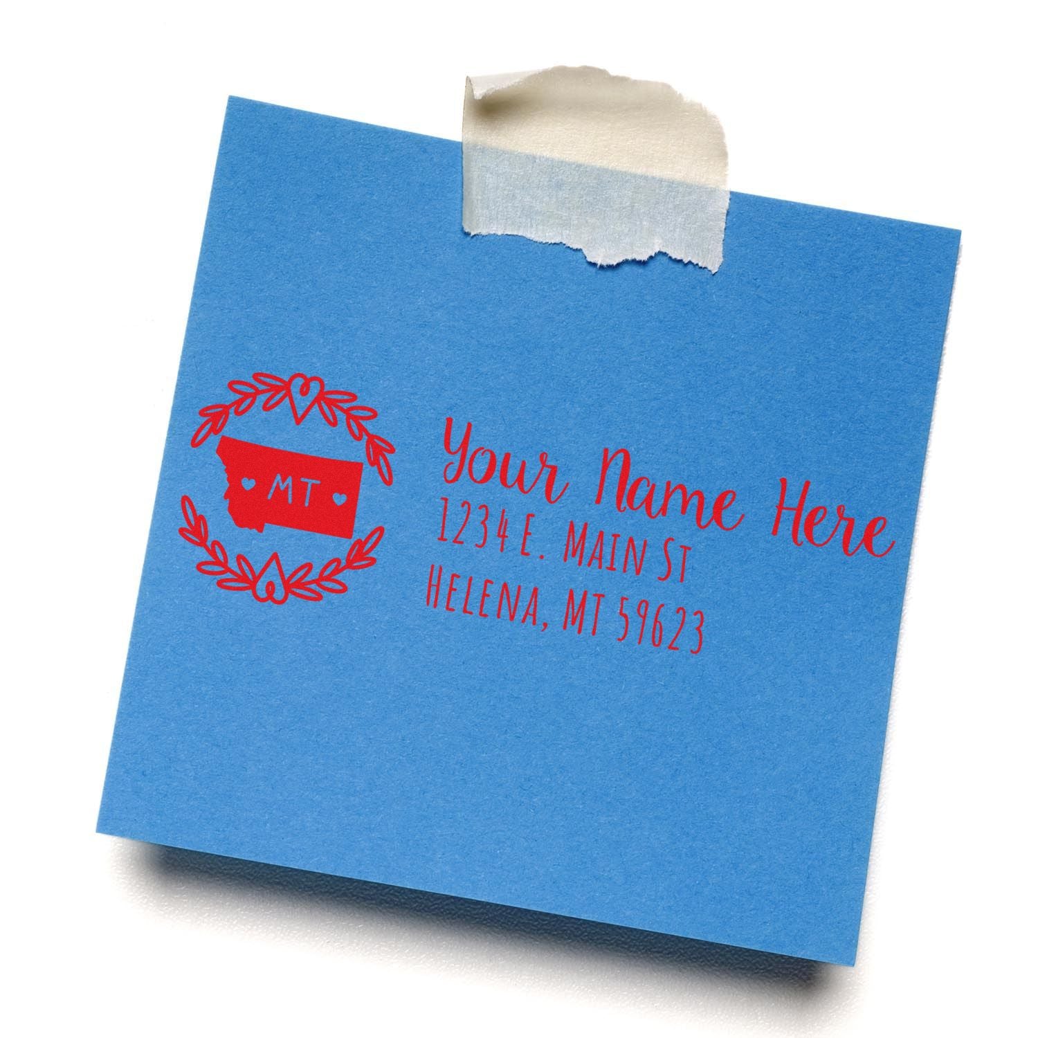 Blue paper with red ink showing the PSI Pre-Inked Montana State Customized Address Stamp, featuring a Montana outline and sample address text.