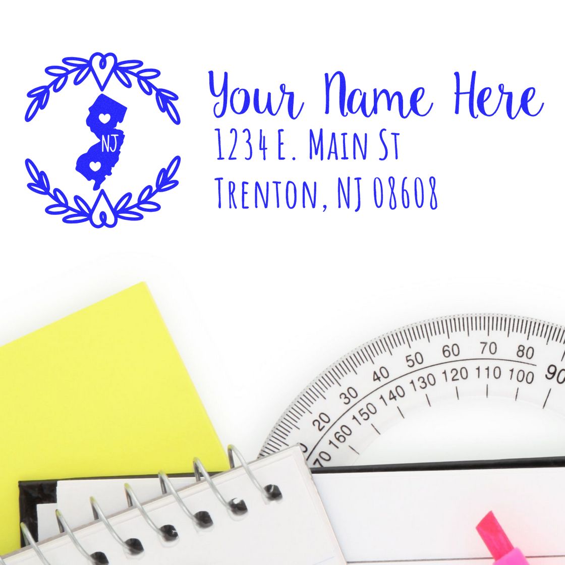 New Jersey State Custom Return Address Stamp displayed on paper with a ruler, notebook, and sticky notes. The stamp features a blue NJ state outline with space for personalized address details.