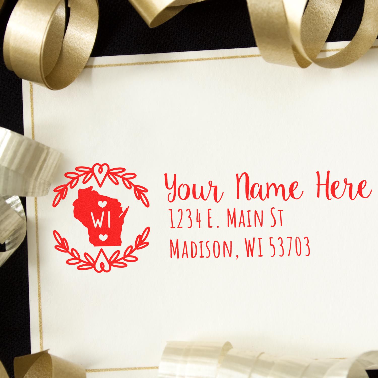 PSI Pre-Inked Wisconsin State Customized Address Stamp on an envelope with gold ribbons, featuring a red Wisconsin outline and placeholder text for name and address in Madison, WI.