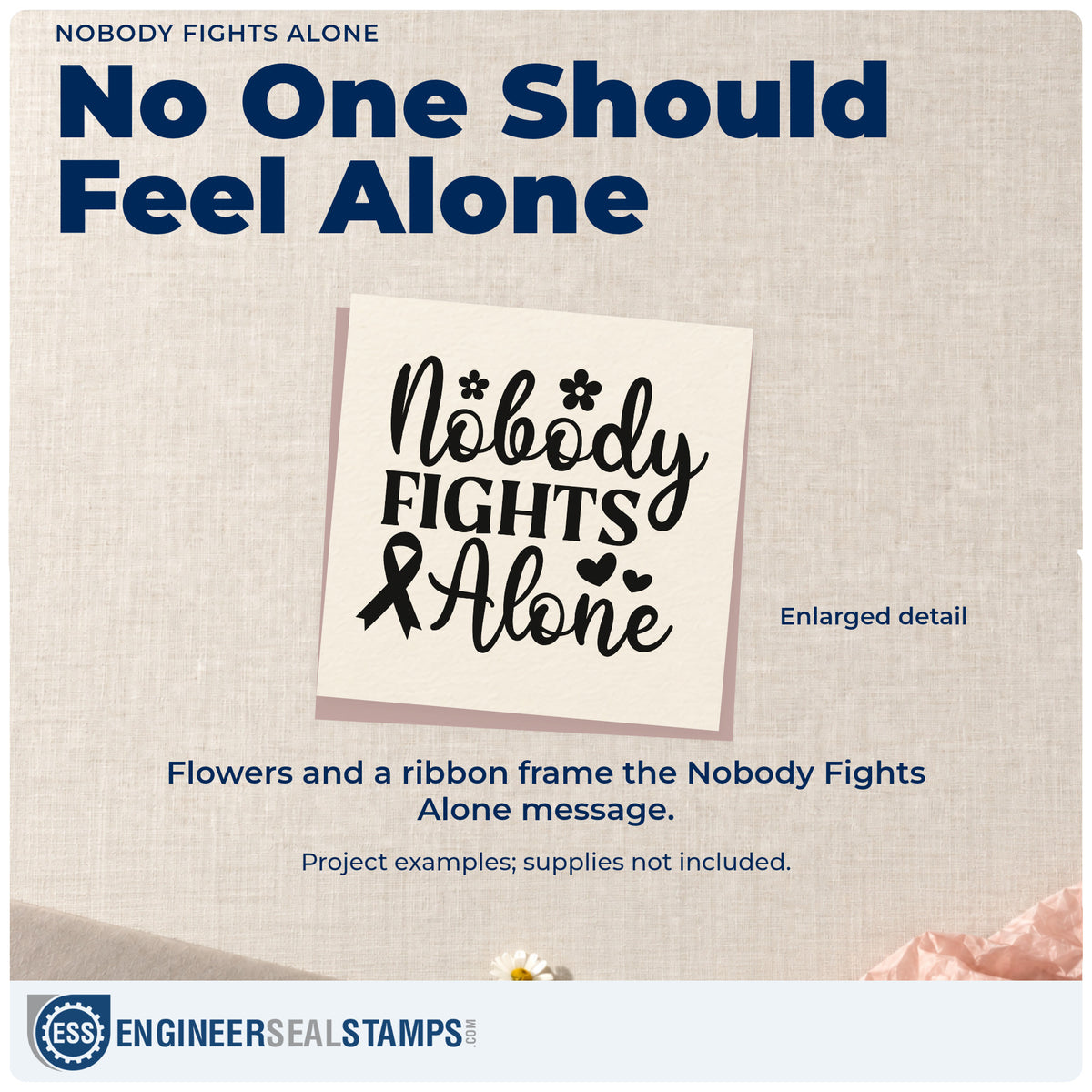 Enlarged detail of the Self-Inking Nobody Fights Alone Awareness Ribbon Stamp imprint. An awareness ribbon, flowers, and hearts accent "Nobody fights alone" in mixed lettering.