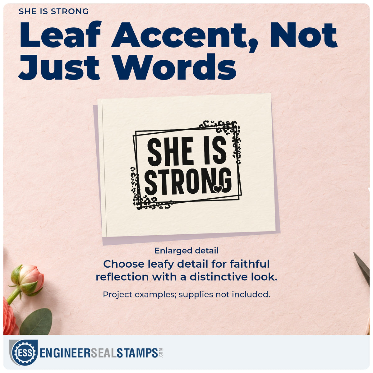 Enlarged detail of the She Is Strong Leaf Accents Rubber Stamp – Duo Hand imprint. Leafy corners and a small heart accent bold "She is strong" lettering inside overlapping frames.