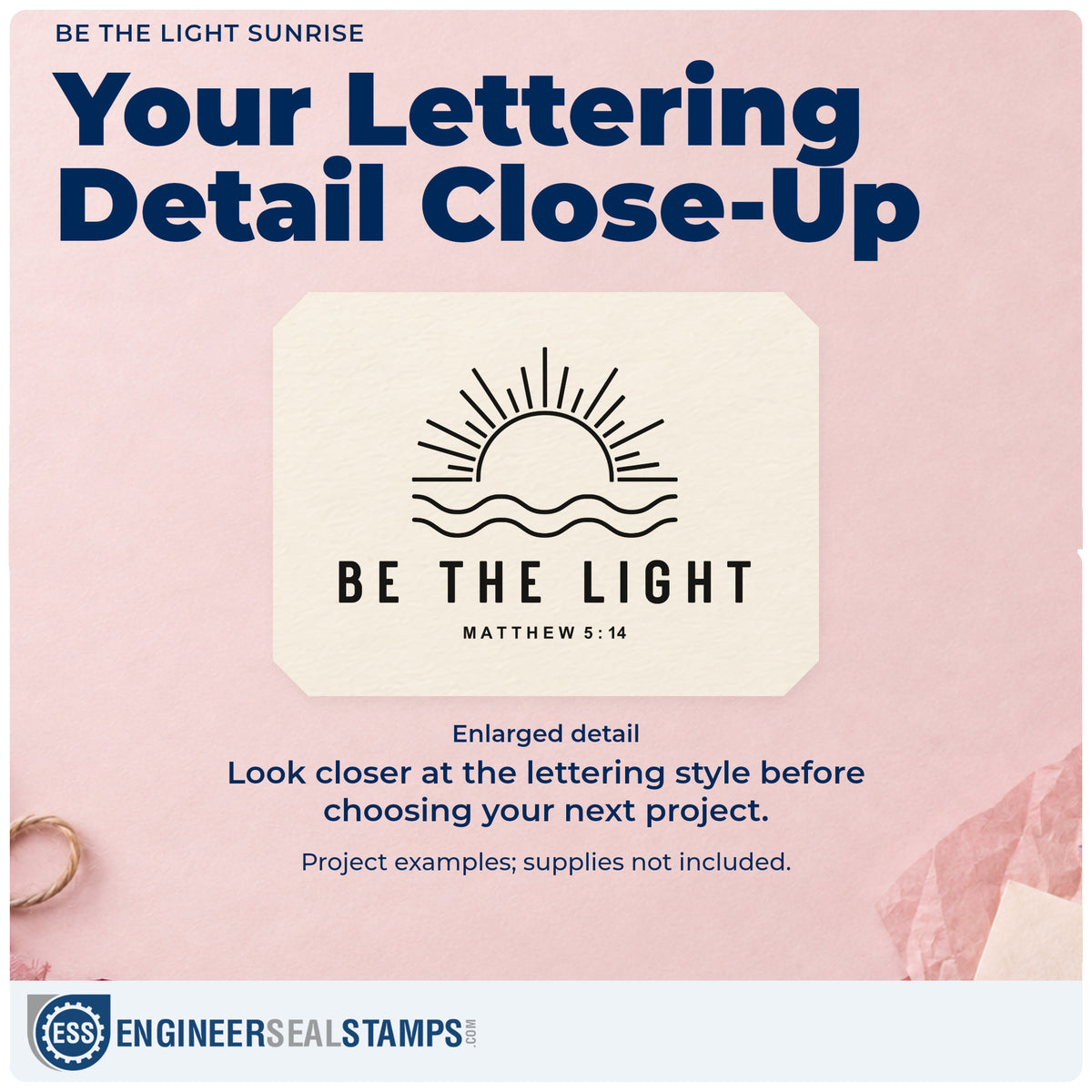 Enlarged detail of the Be The Light Sunrise Wood Handle Stamp imprint. A sun rising over wavy lines appears above "Be the light" and Matthew 5:14.