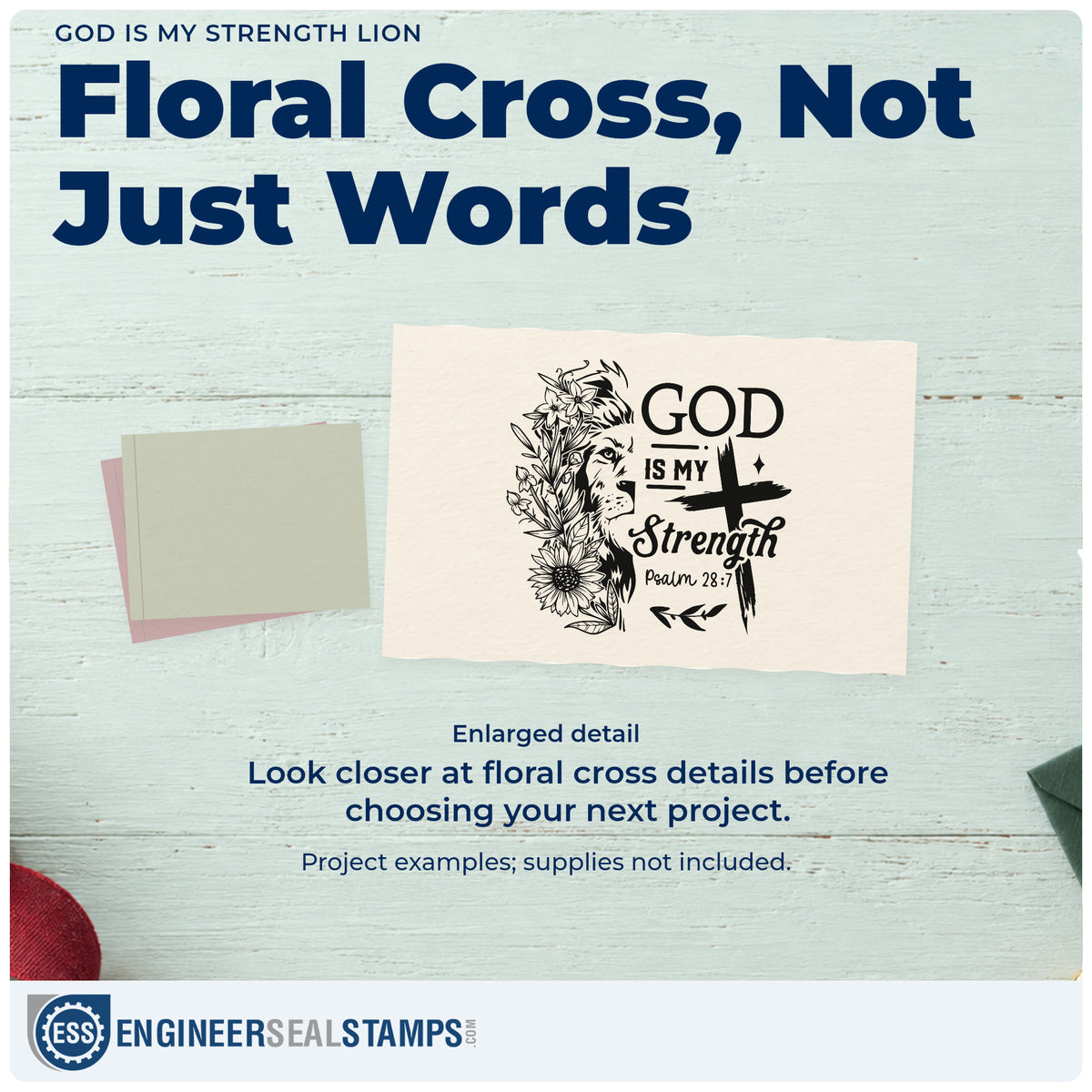 Enlarged detail of the God Is My Strength Lion Pre-Inked Stamp – Slim imprint. Half of a lion's face is surrounded by flowers beside a cross and "God is my strength," with Psalm 28:7.