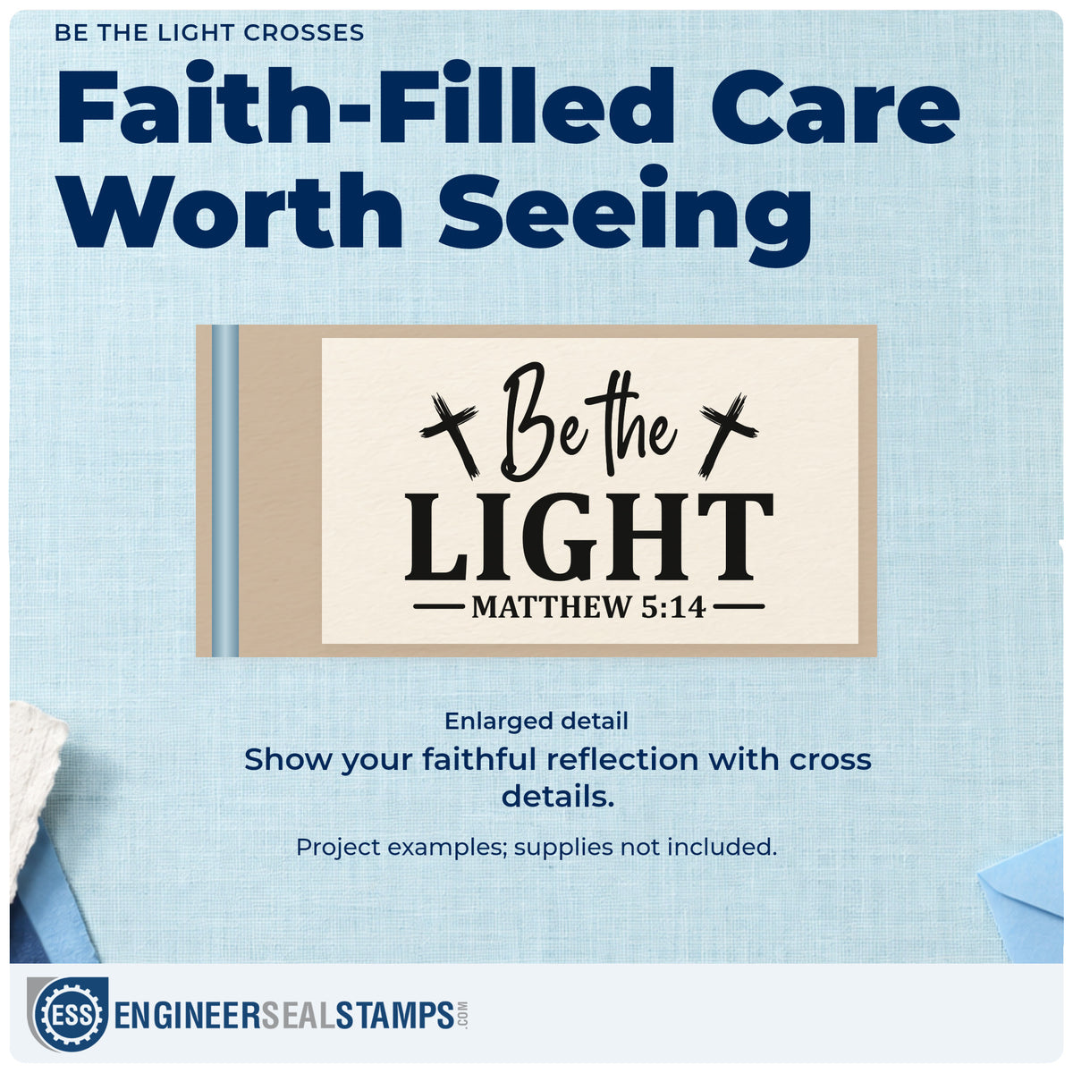 Enlarged detail of the Be The Light Crosses PSI Pre-Inked Stamp imprint. Two tilted crosses flank "Be the" above bold "Light" and Matthew 5:14.