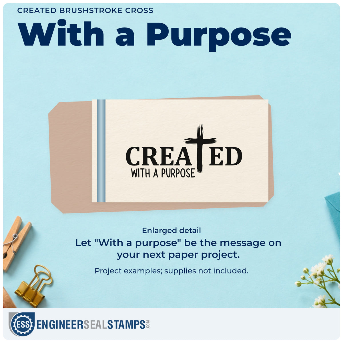 Enlarged detail of the Created Brushstroke Cross Wood Handle Stamp imprint. A brushstroke cross replaces the T in "Created," above "With a purpose."