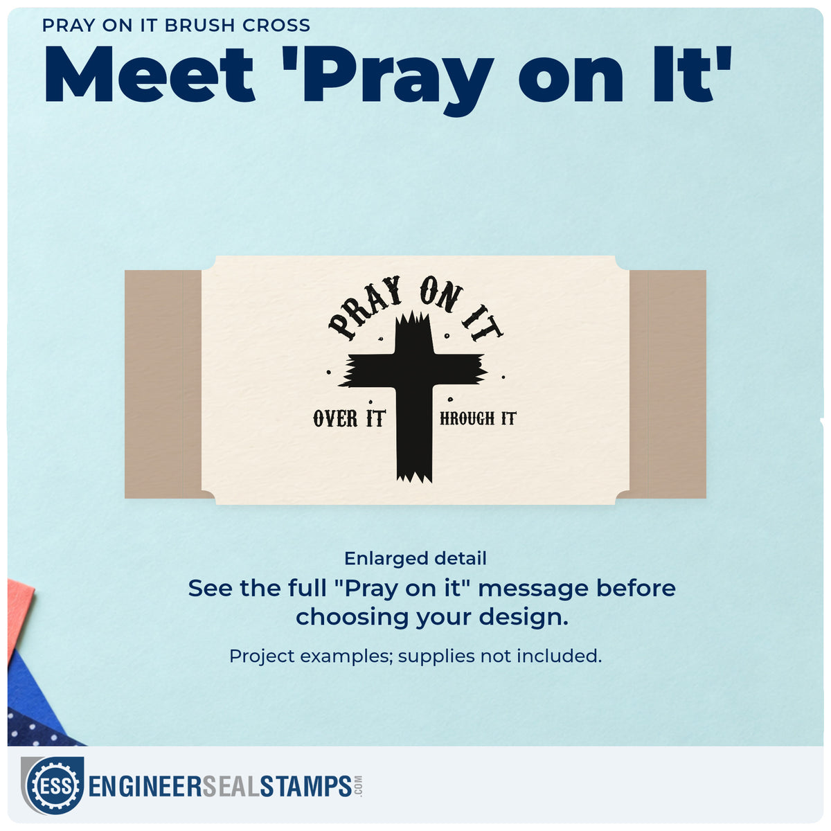 Enlarged detail of the Pray On It Brush Cross Arch Self-Inking Stamp imprint. A large brushstroke cross sits beneath arched "Pray on it," with "Over it" on the left and the cross forming the T in "Through it" on the right.