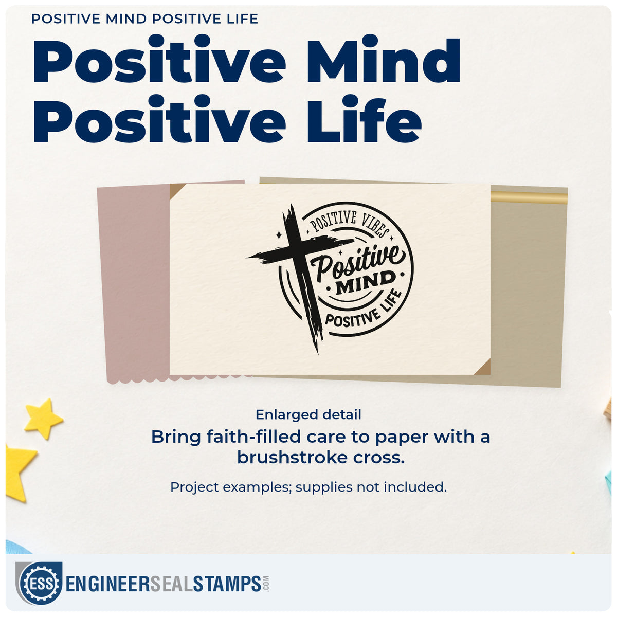 Enlarged detail of the Positive Mind Positive Life Self-Inking Stamp imprint. A brushstroke cross overlaps a circular design reading "Positive vibes, positive mind, positive life."