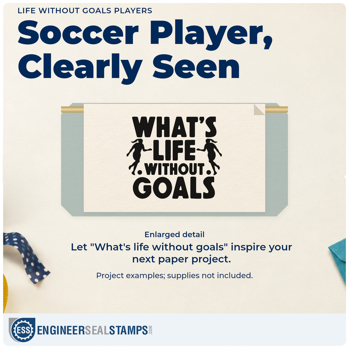 Enlarged detail of the Life Without Goals Players Rubber Stamp – Wood Handle imprint. Two soccer player silhouettes flank bold "What's life without goals" lettering.