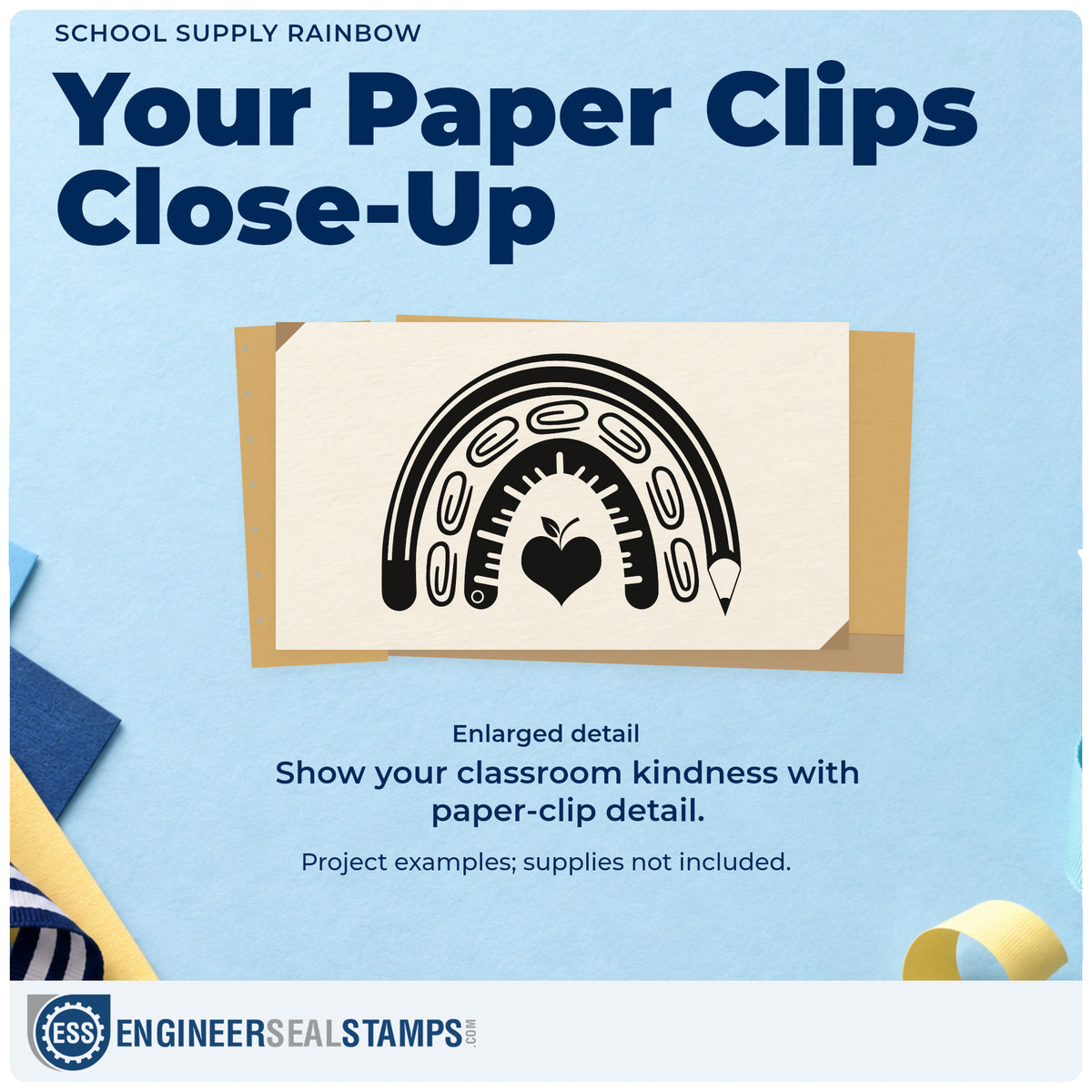Enlarged detail of the School Supply Rainbow Apple Stamp – Duo Hand imprint. A pencil, paper clips, and ruler form rainbow arches above an apple-shaped heart.