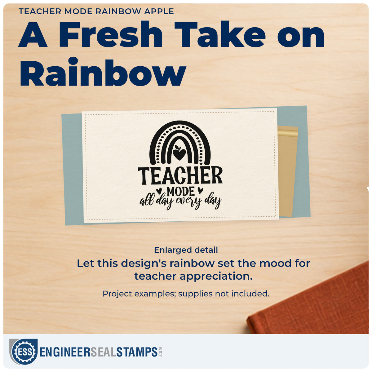 Enlarged detail of the Teacher Mode Rainbow Apple Pre-Inked Stamp – PSI imprint. “Teacher Mode All Day Every Day” appears beneath a patterned rainbow enclosing an apple.