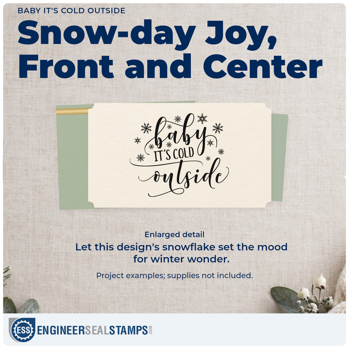 Enlarged detail of the Baby It's Cold Outside Snowflakes Self-Inking Stamp imprint. “Baby It's Cold Outside” appears in swirling script with snowflakes and stars.