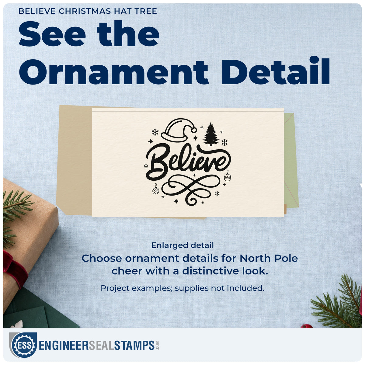 Enlarged detail of the Believe Christmas Hat Tree Self-Inking Stamp imprint. Large script “Believe” is surrounded by a Santa hat, tree, ornaments, snowflakes, and looping flourish.