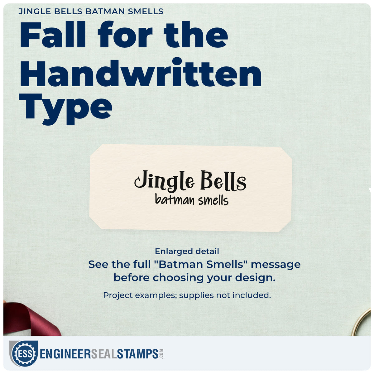 Enlarged detail of the Jingle Bells Batman Smells Wood Handle Stamp imprint. “Jingle Bells” sits above smaller handwritten “Batman Smells.”