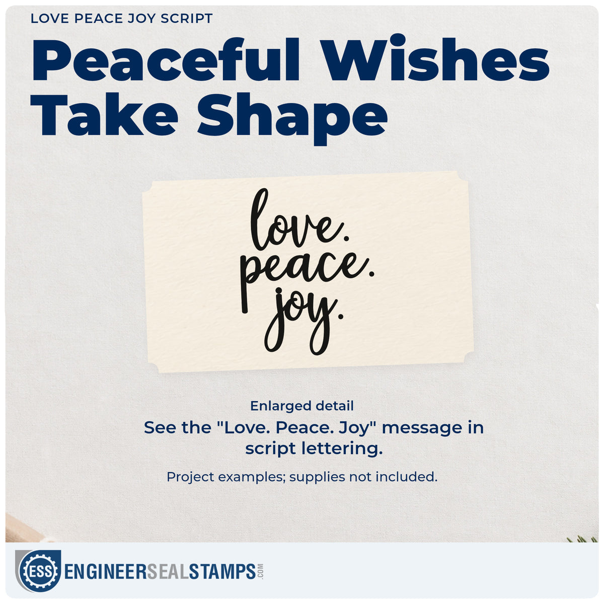 Enlarged detail of the Love. Peace. Joy Self-Inking Stamp imprint. Three stacked script words read “Love. Peace. Joy.”
