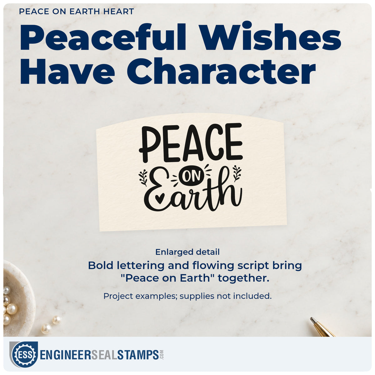 Enlarged detail of the Peace On Earth Botanical Sprig Wood Handle Stamp imprint. “Peace on Earth” combines capitals and script with a small heart and leafy sprigs.