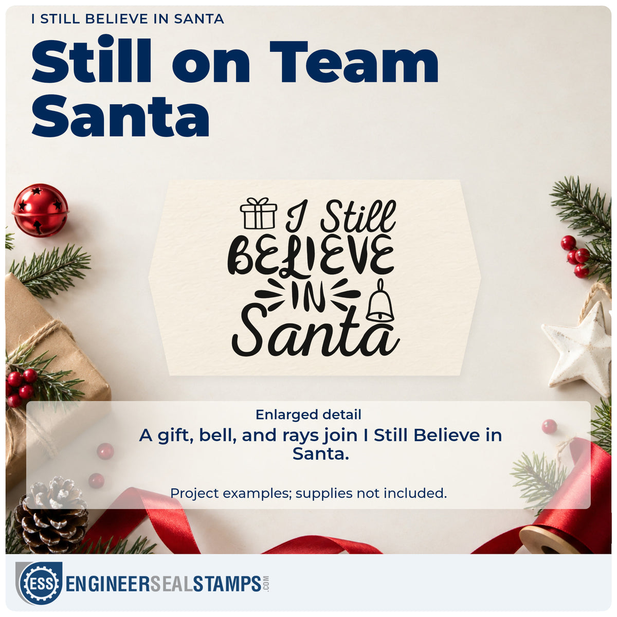 Enlarged detail of the I Still Believe In Santa Wood-Mounted Rubber Stamp imprint. “I Still Believe in Santa” appears with a gift, bell, and radiating strokes.