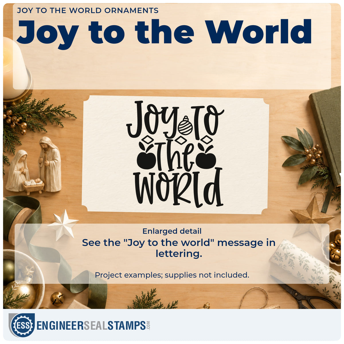 Enlarged detail of the Joy To The World Ornaments Lettering Wood Handle Stamp imprint. The words "Joy to the world" include hanging ornaments and diamond accents.
