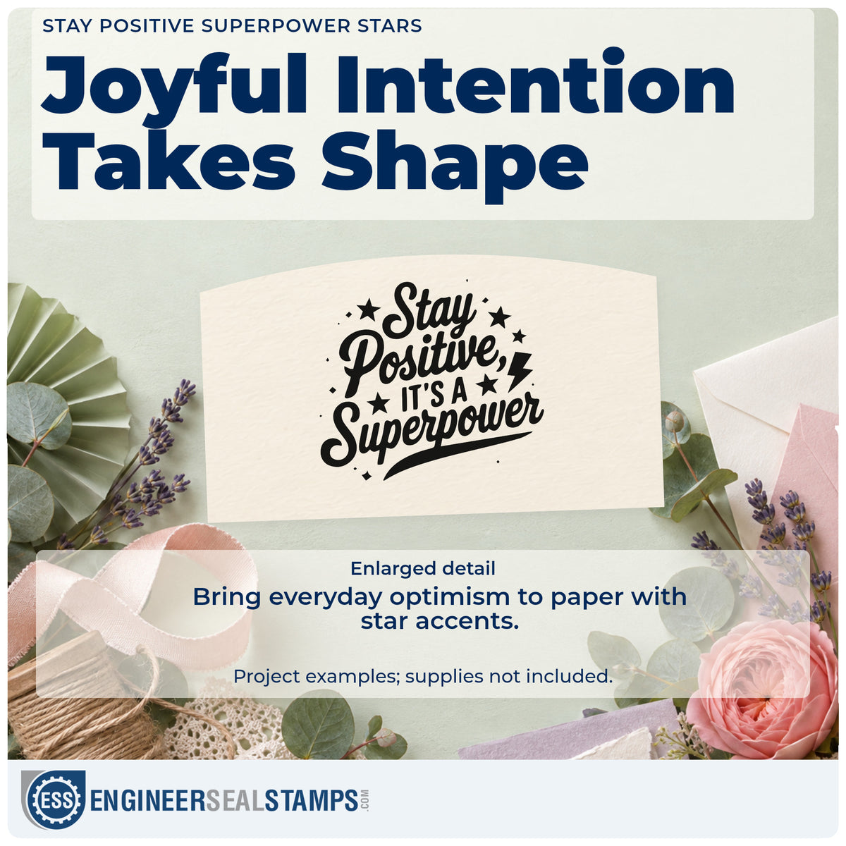 Enlarged detail of the Stay Positive It's A Superpower Rubber Stamp – Duo Hand imprint. Stay Positive IT'S A Superpower appears with stars and lightning bolts.