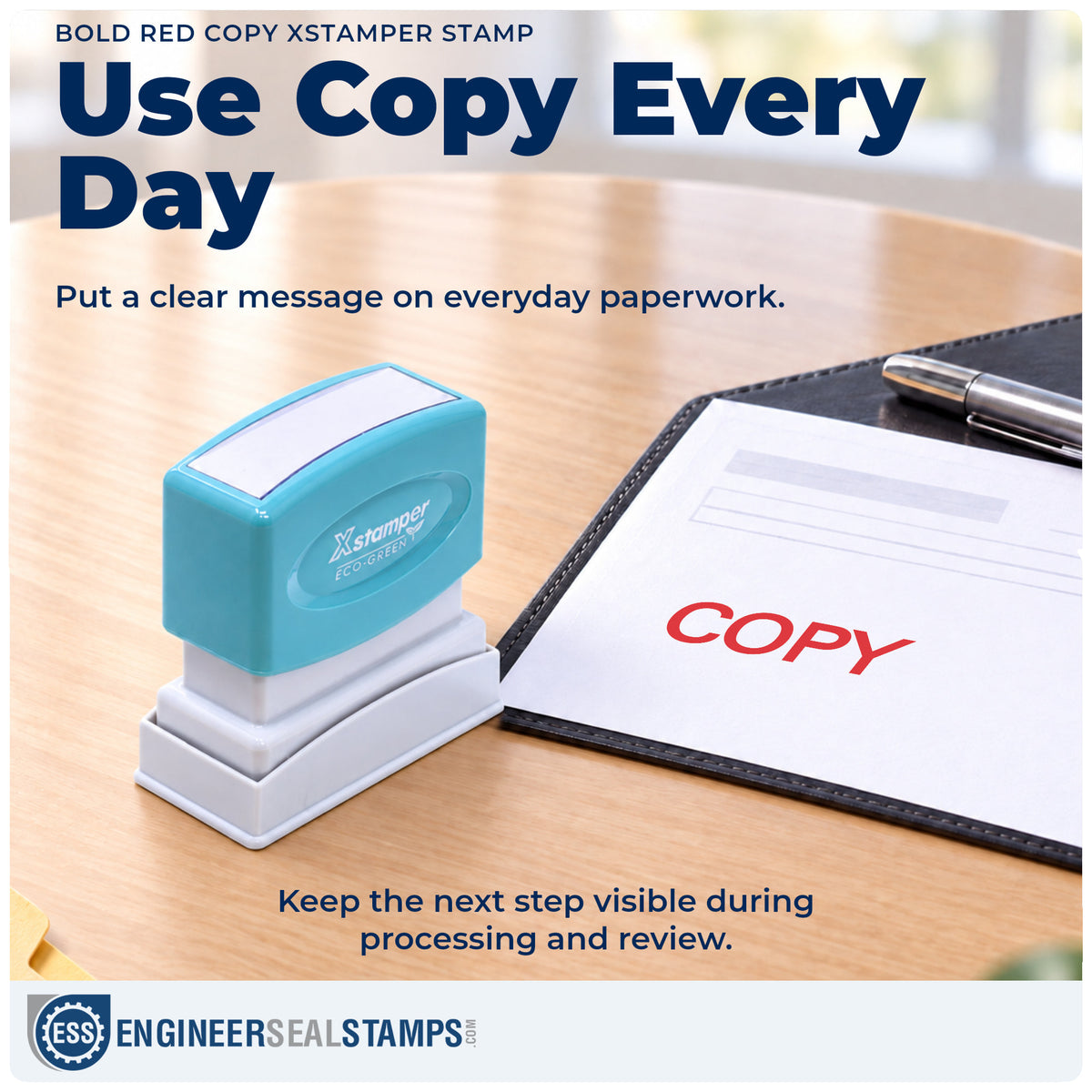 "Copy" stamp being pressed onto a document during everyday filing