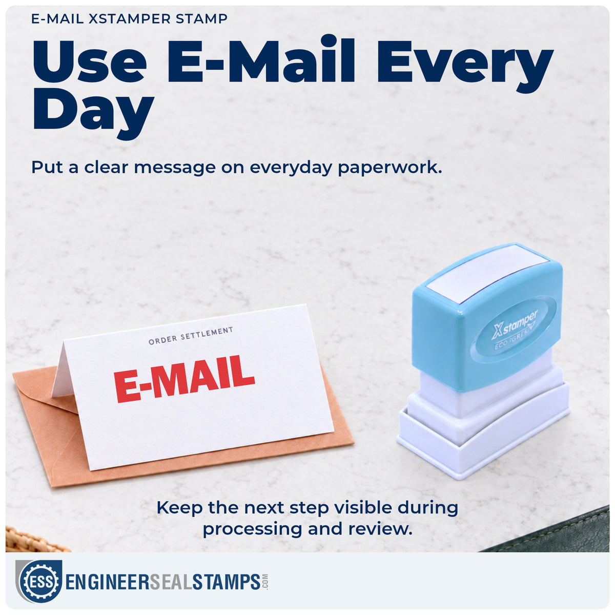 "E-mail" stamp being pressed onto a document during everyday filing