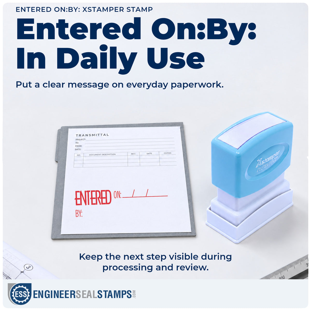 "Entered on: by:" stamp being pressed onto a document during everyday filing