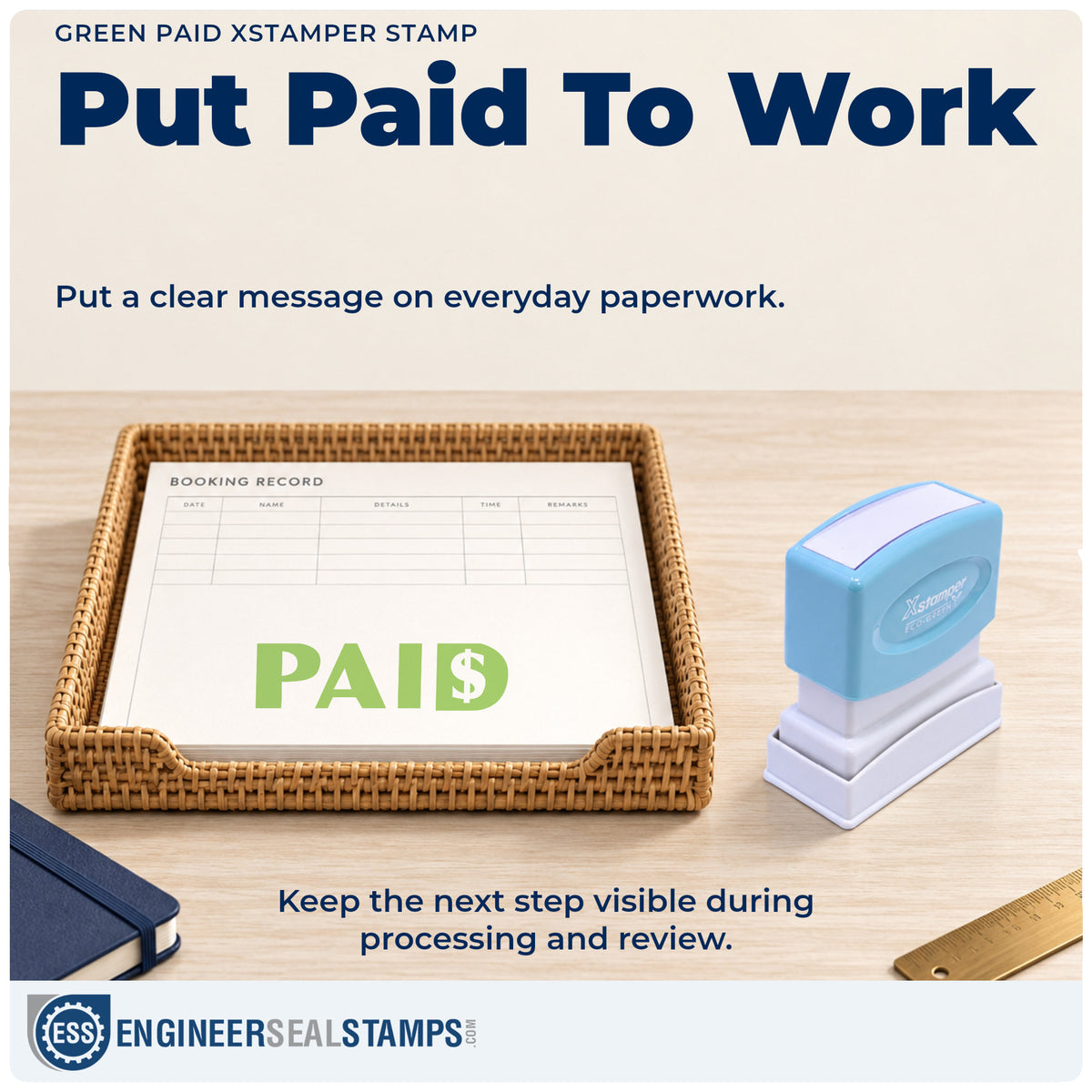 "Paid" stamp being pressed onto a document during everyday filing
