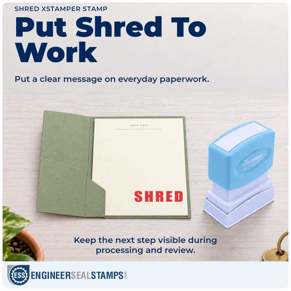 "Shred" stamp being pressed onto a document during everyday filing