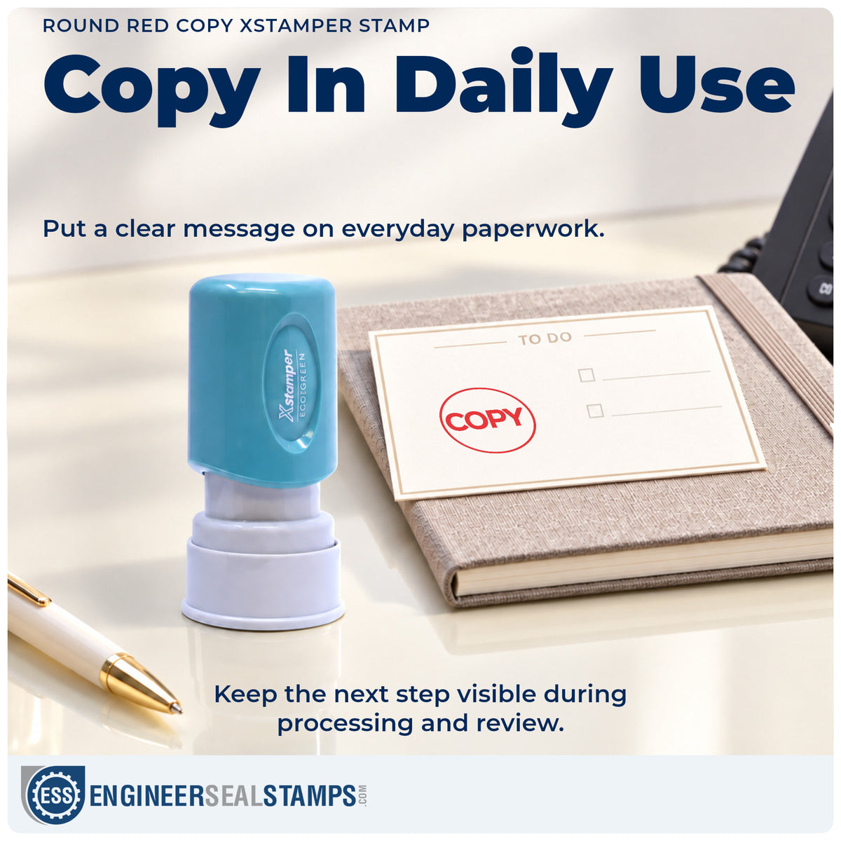 "Copy" stamp being pressed onto a document during everyday filing