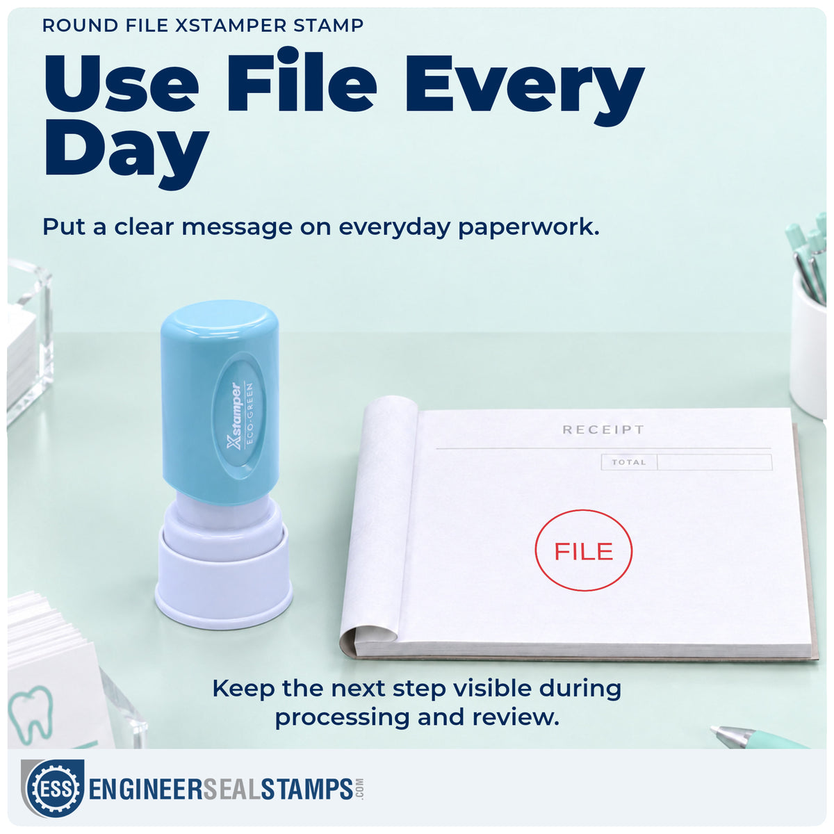 "File" stamp being pressed onto a document during everyday filing