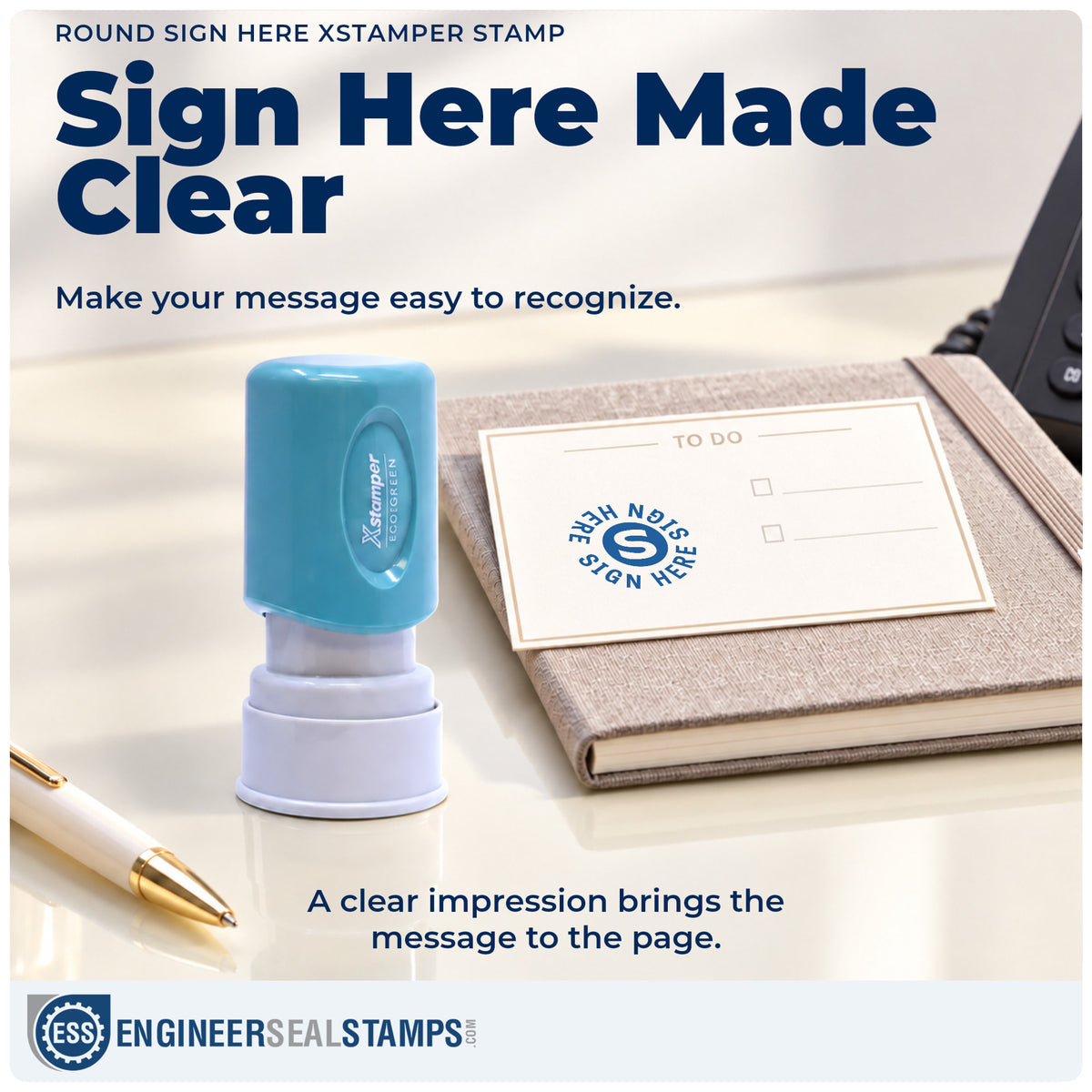 "Sign here" imprint on office paperwork beside the Sign Here Document Stamp – Round Blue Pre-Inked Xstamper
