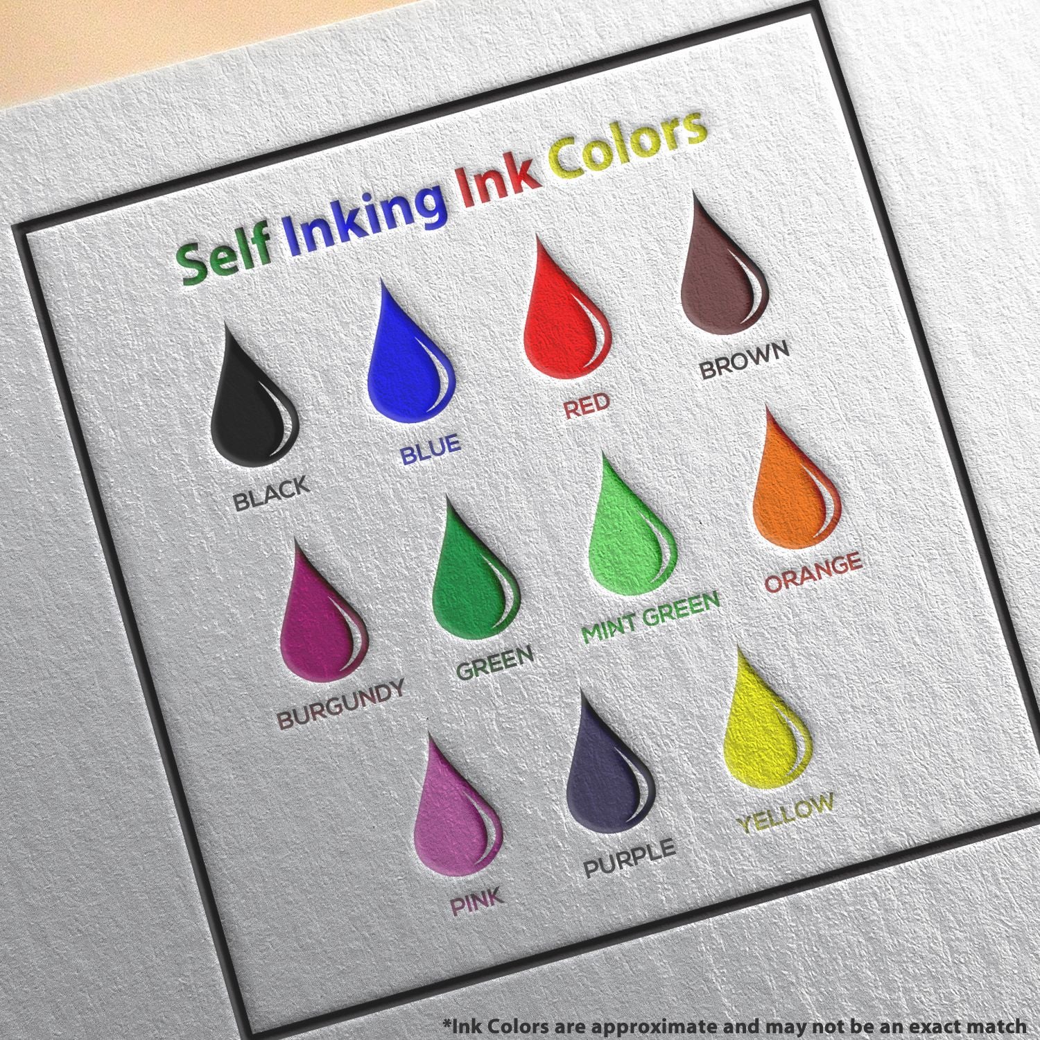 Self-inking stamp and seal ink color chart with droplet swatches in black, blue, red, green, orange, pink, purple, yellow.