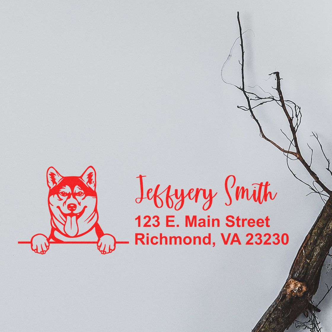 Red custom stamp and seal with dog logo and return address: Jeffery Smith, 123 E. Main Street, Richmond, VA 23230