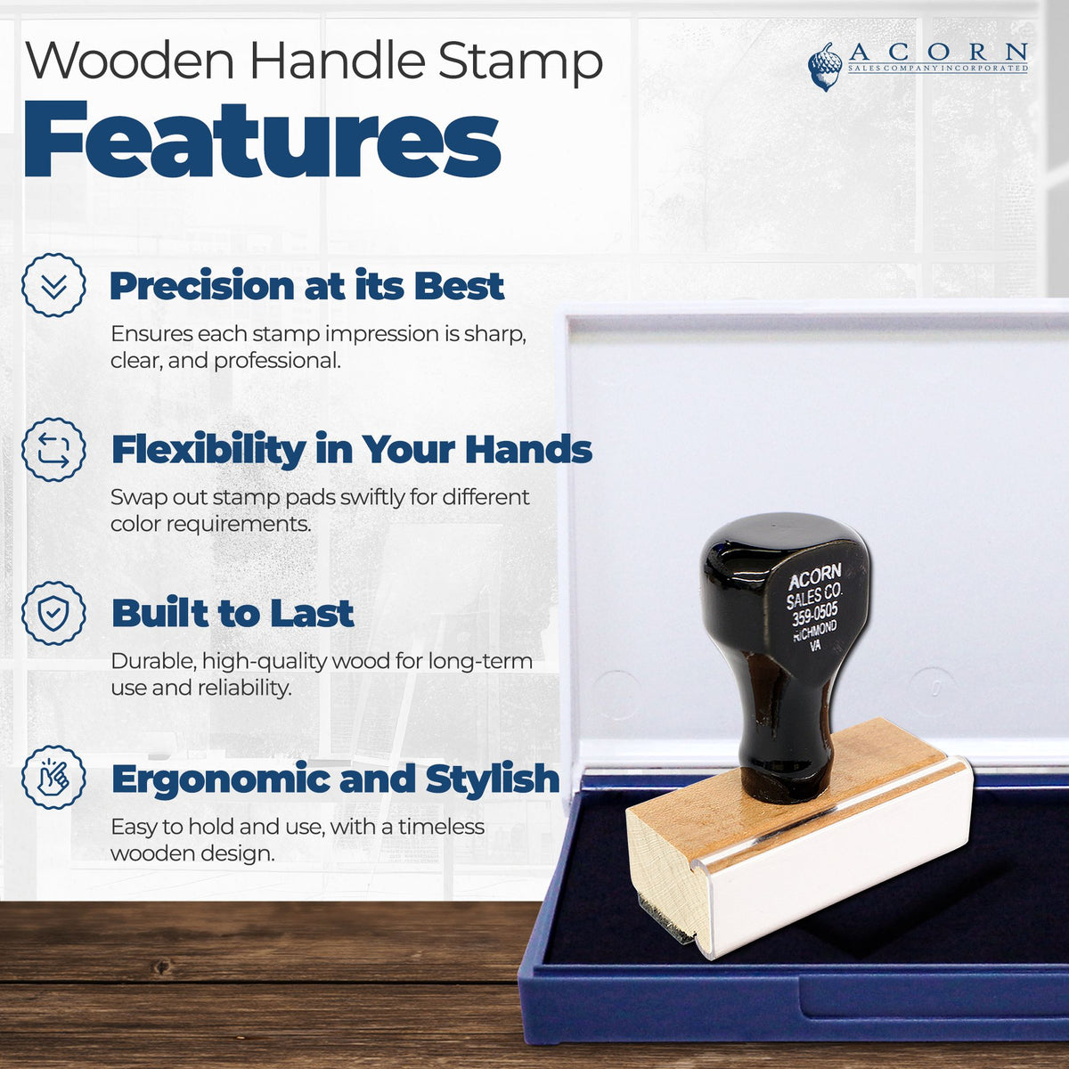 Black wooden handle rubber stamp on white base in blue case, featuring Acorn Sales Co. branding and product features.