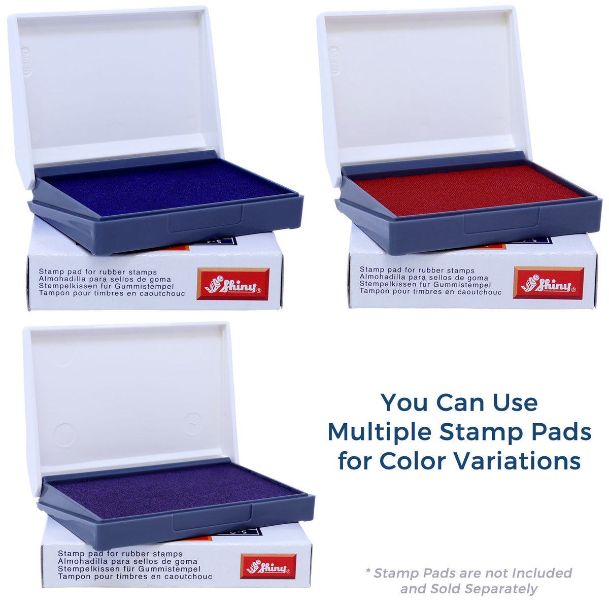 Three open Shiny rubber stamp pads for seals in blue, red, and purple with white lids on boxes.