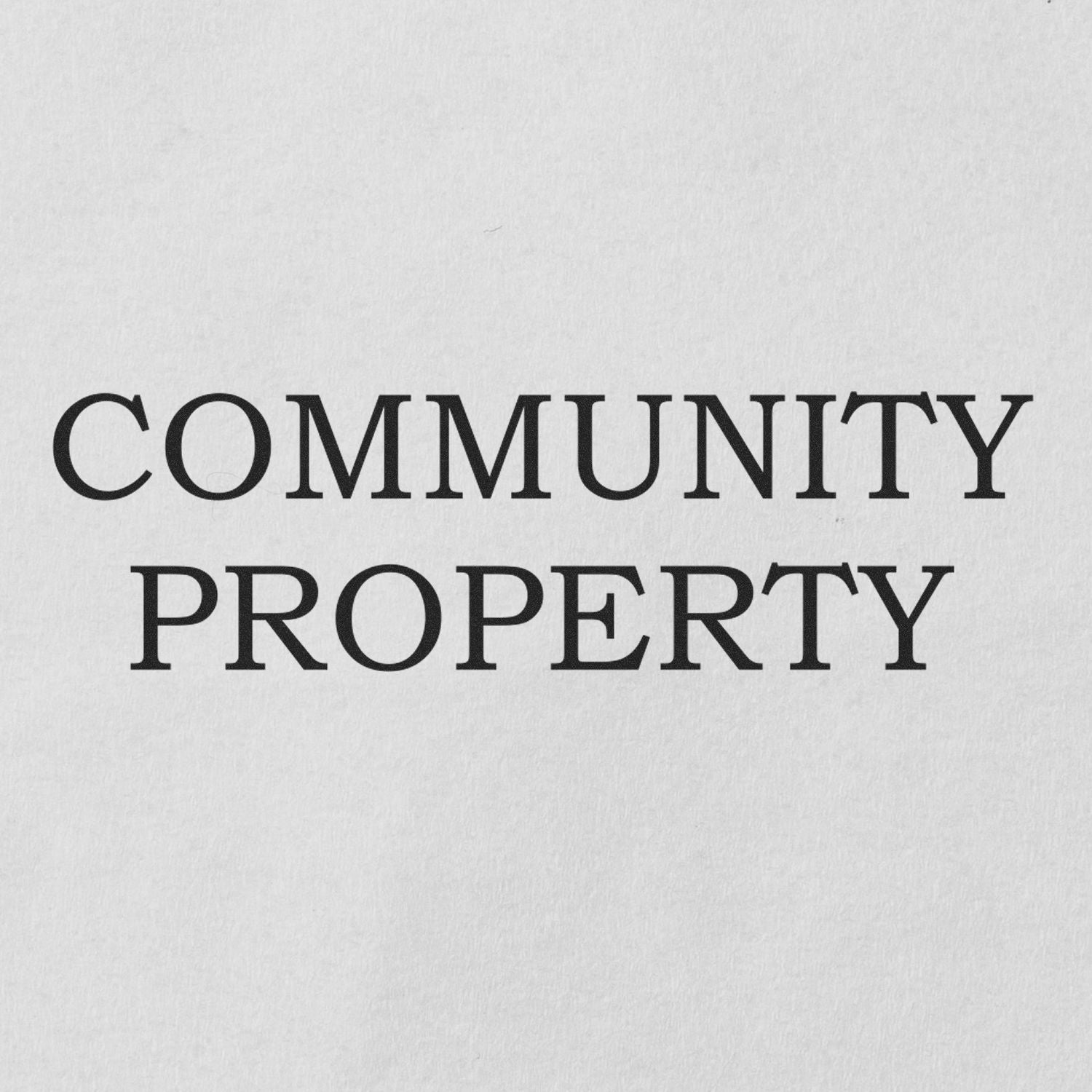 Image of the Large Pre-Inked Community Property Stamp imprinting the words COMMUNITY PROPERTY in bold black letters on a white background.