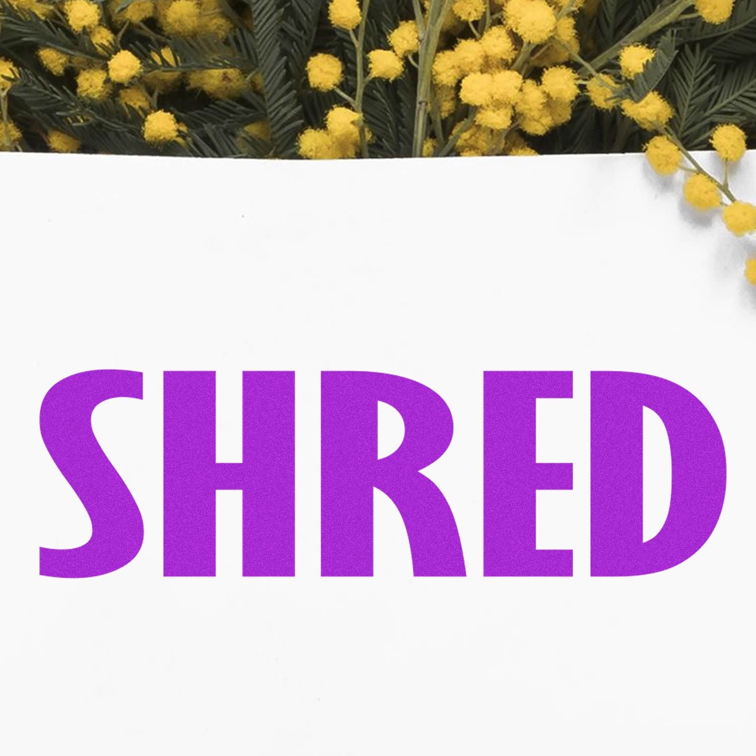 Large Pre-Inked Shred Stamp with bold purple SHRED text on a white background, surrounded by yellow flowers.